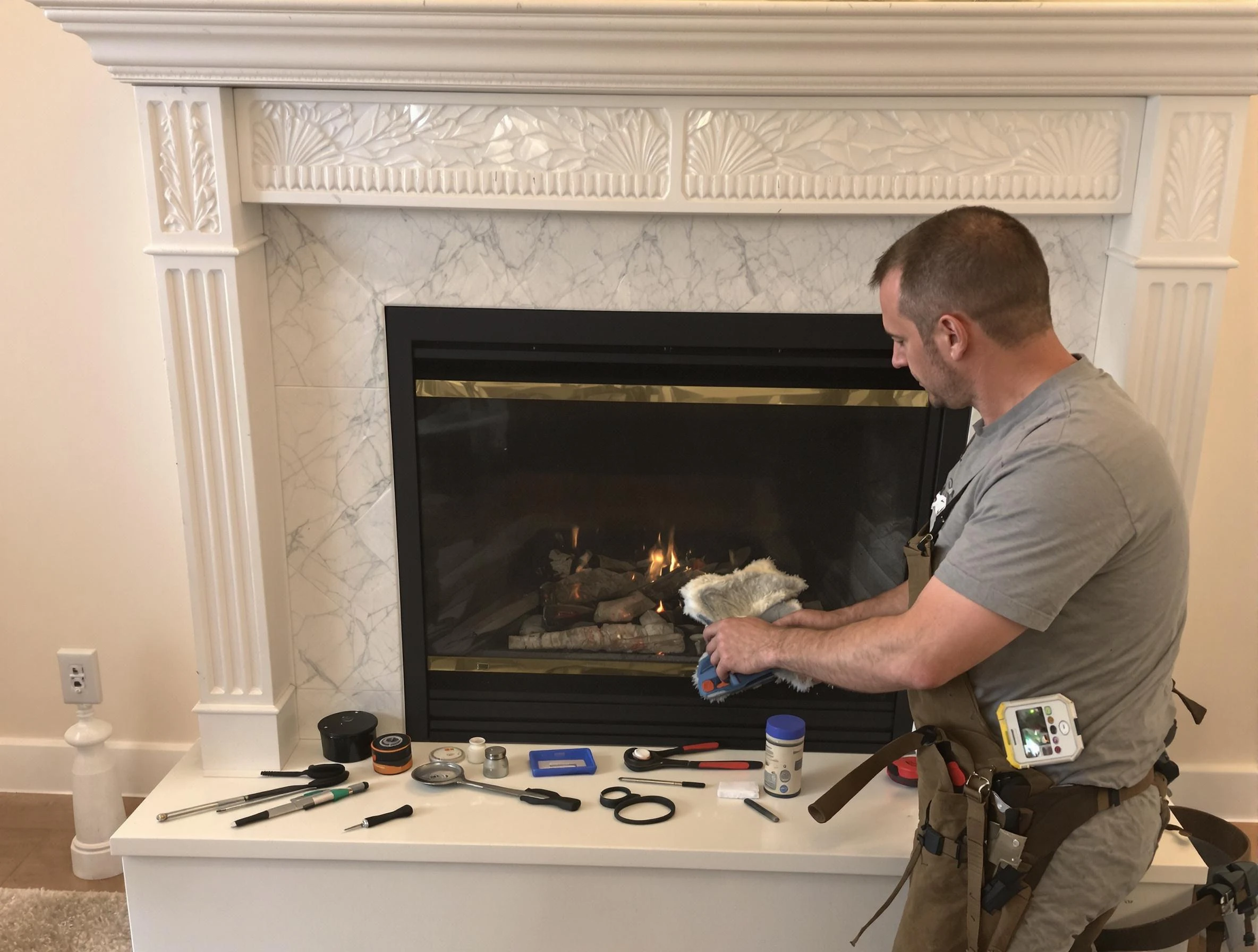 Broomfield Chimney Sweep performing fireplace maintenance in Broomfield, CO